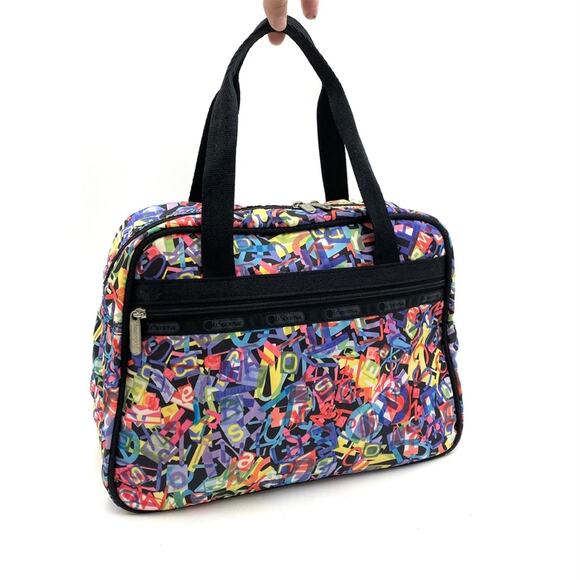 Lesportsac Handbags - Lesportsac Medium Travel Bag Vintage Multi Logo Print Duffle Weekender